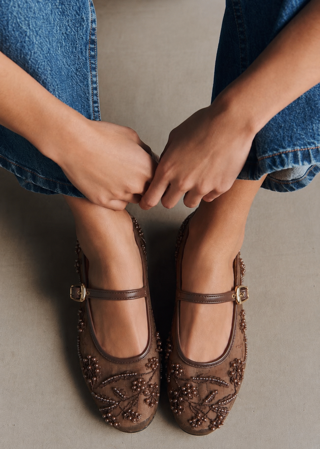 Brown pearl embellished mesh flat pumps