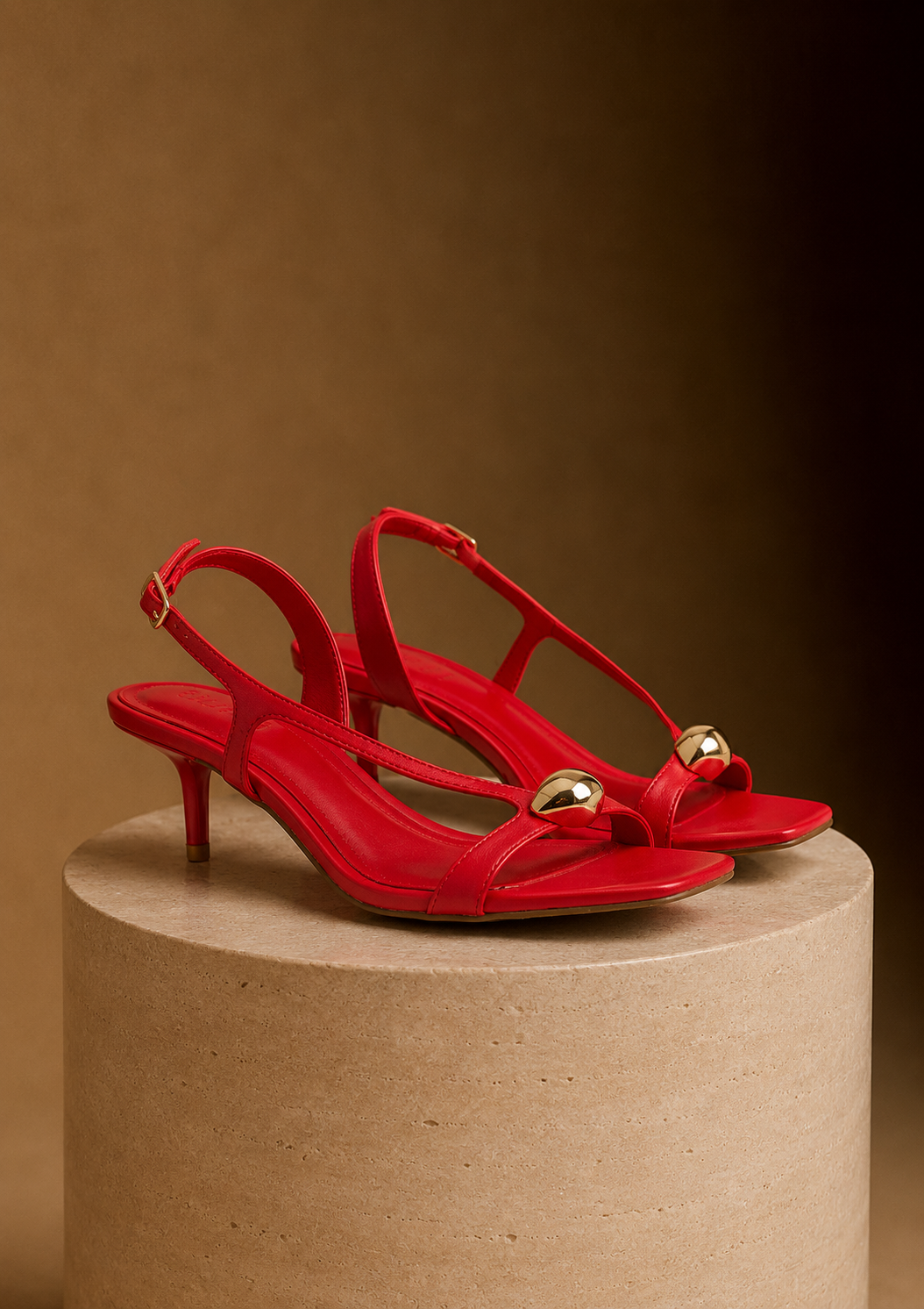 Red strappy gold brooch low heel shoes