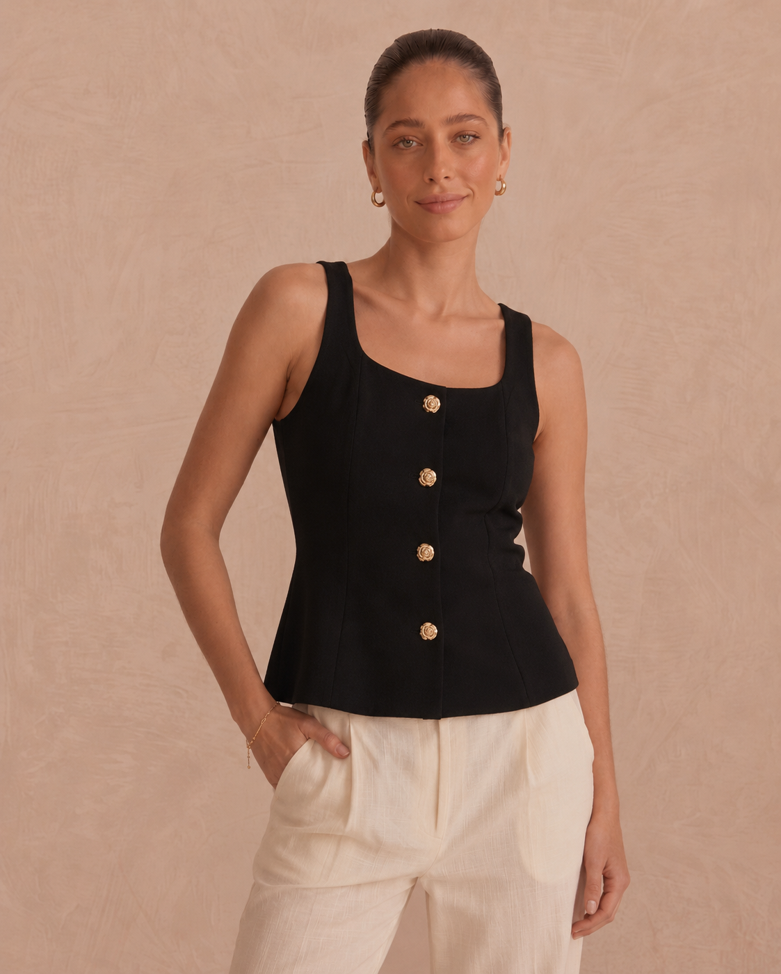 Marla black top with gold flower buttons